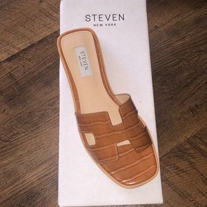 Bought wrong size. Never worn. Purchased for $80